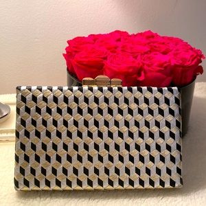 BCBGMaxAzria black silver and gold square patterned clutch